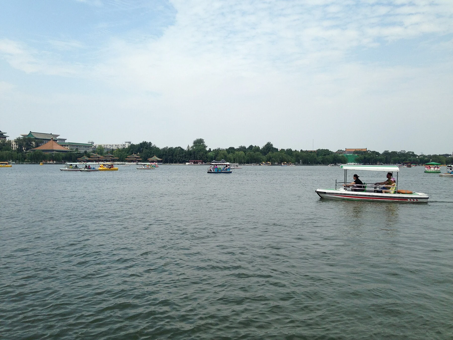 The view across Beihai Lake from inside a passenger boat.