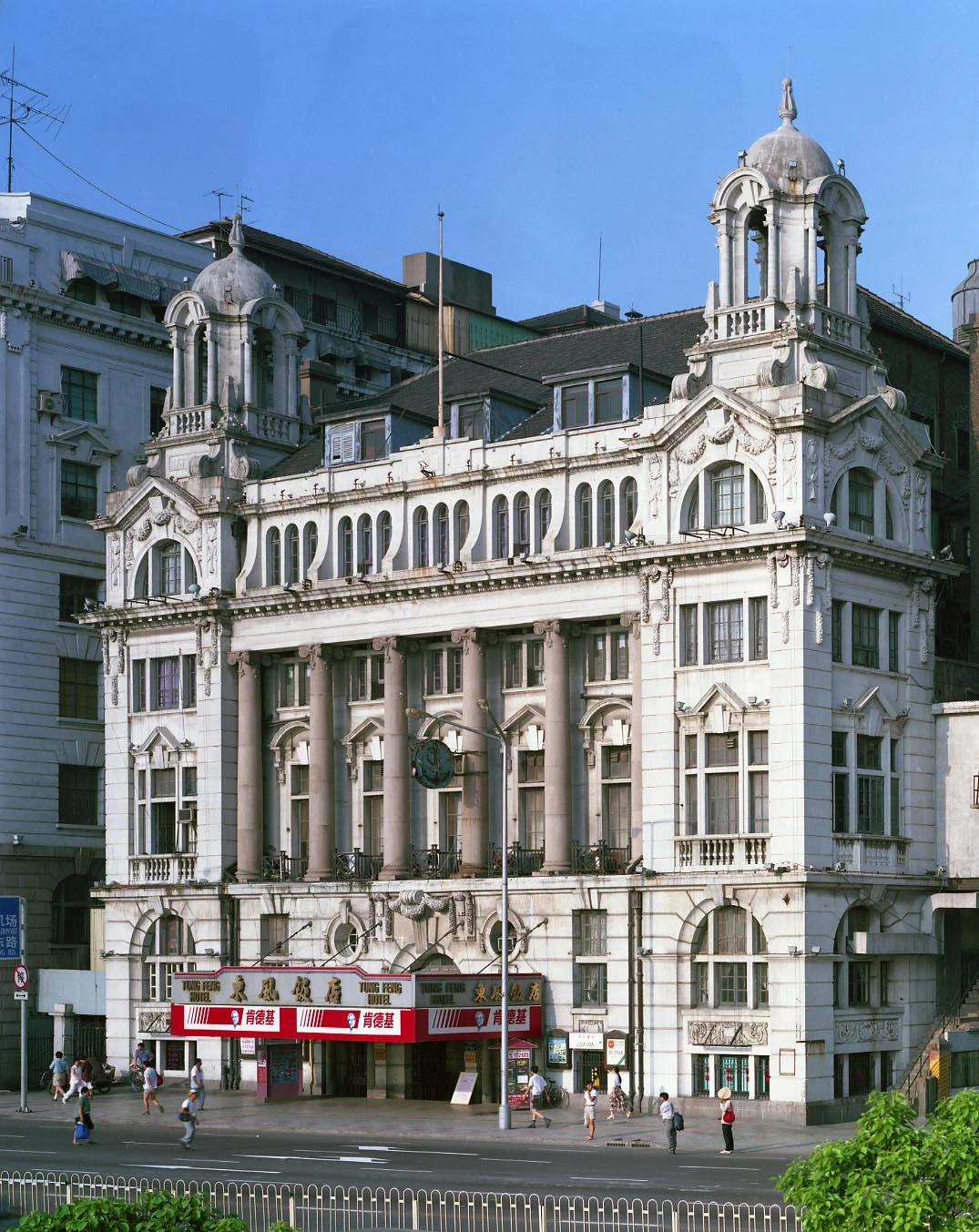 The old club building with a red KFC sign at street level.
