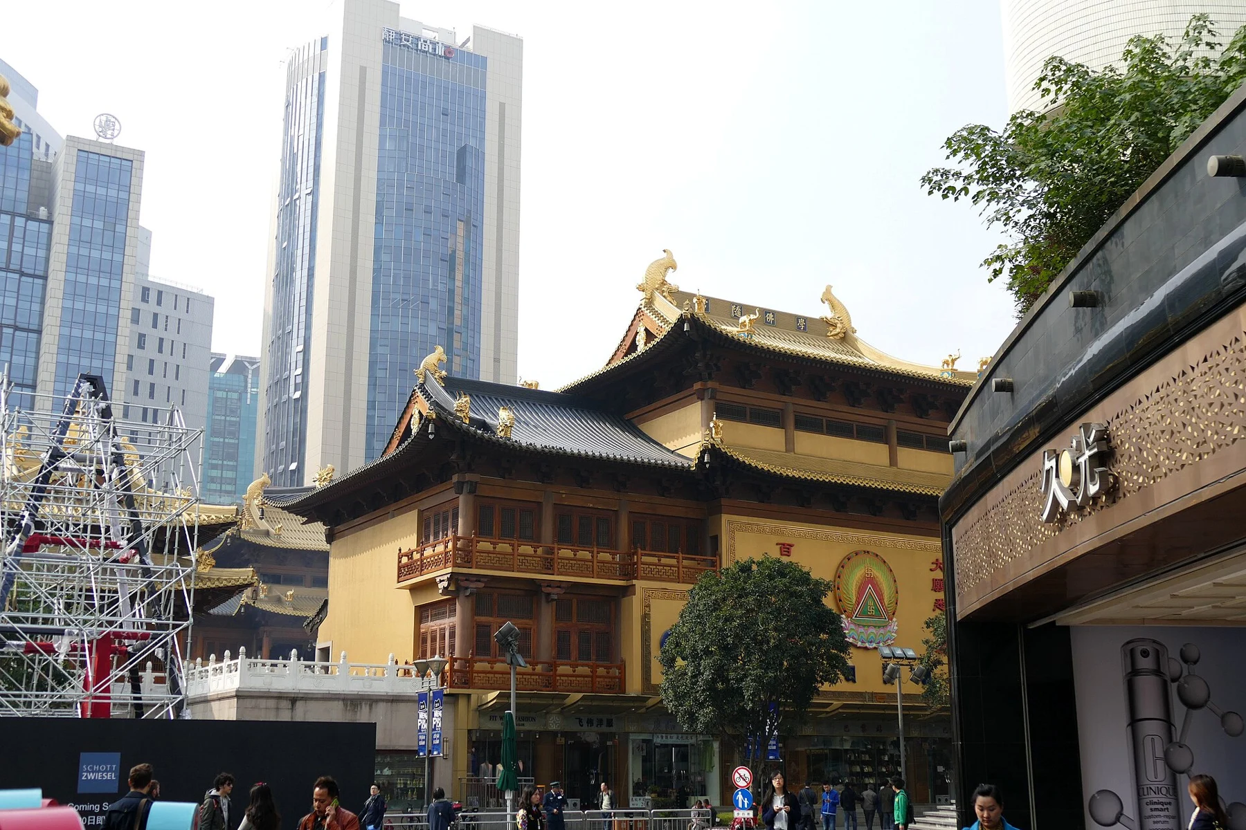Temple frontage and layered roofs seen from the neighbouring street.