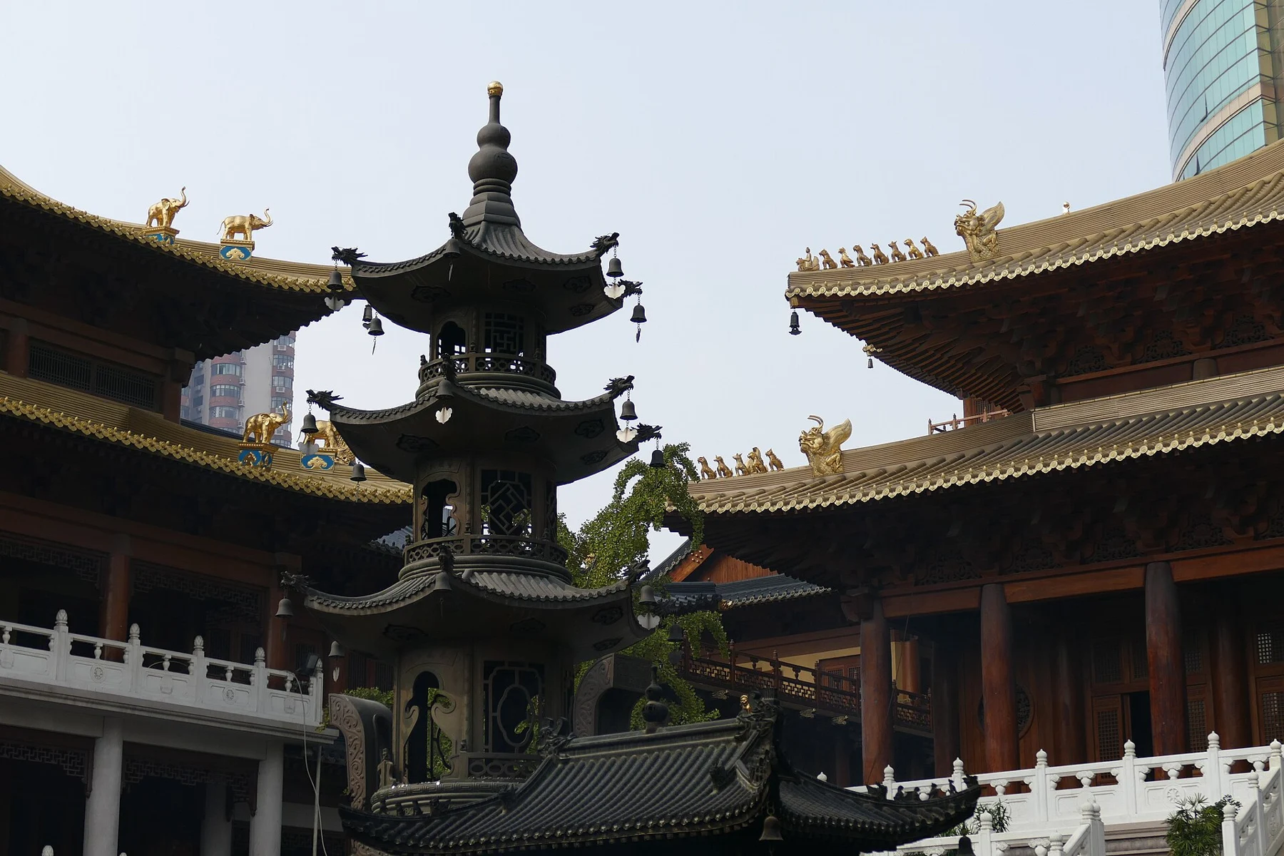 Courtyard structure with tiered top between the surrounding temple halls.