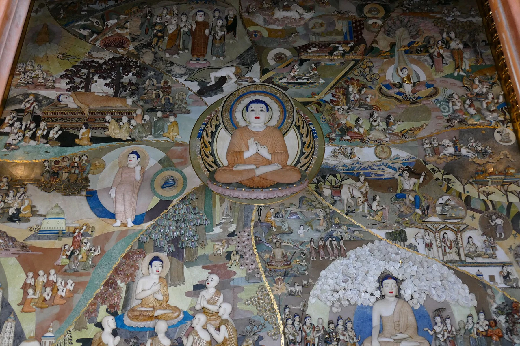 Detailed religious narrative panel filled with people, trees and buildings.
