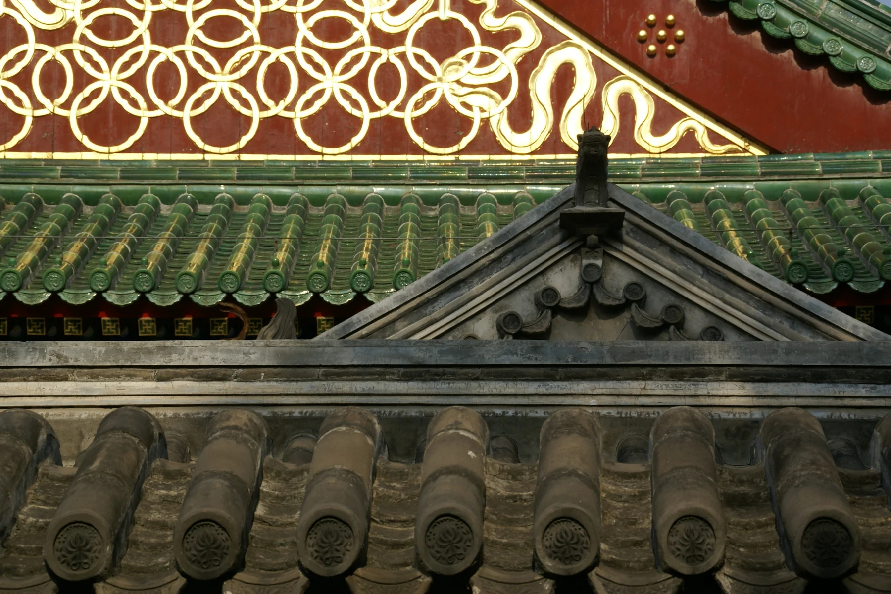 Interlocking gold-coloured circles in a garden architectural detail.