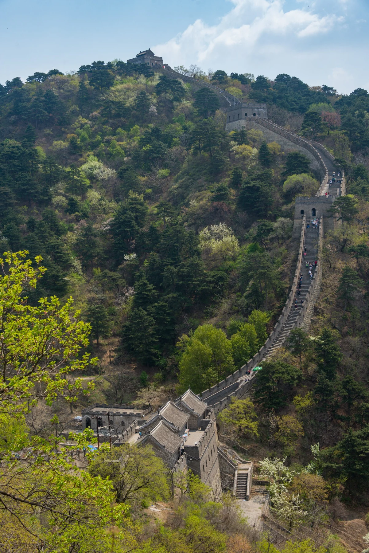 A section of the Mutianyu Great Wall across green hills.