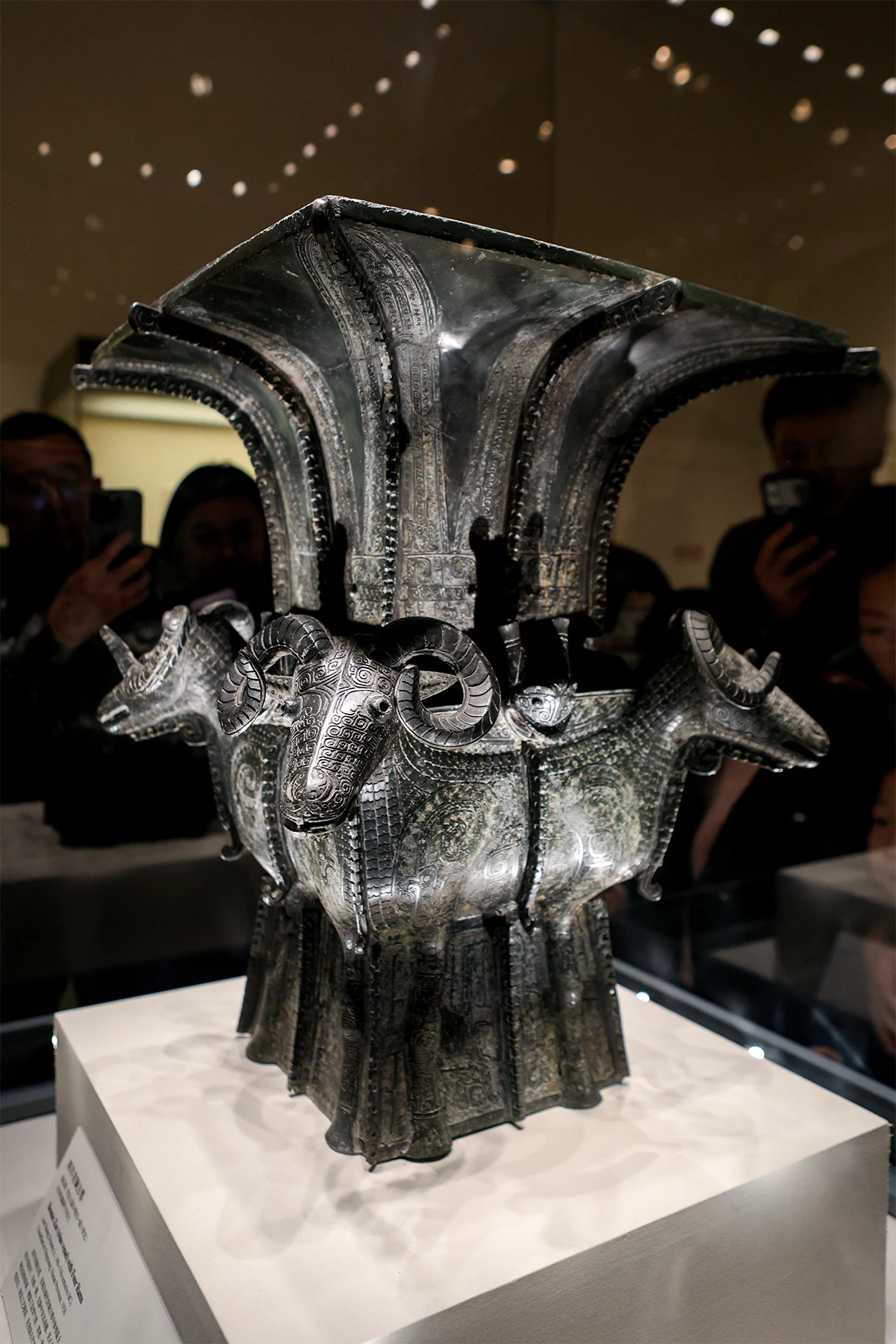 The projecting horns and dense surface decoration of the Four Rams vessel.
