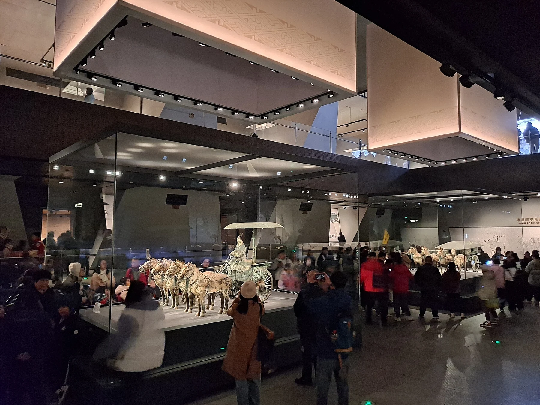 The bronze-chariot display gallery with visitors