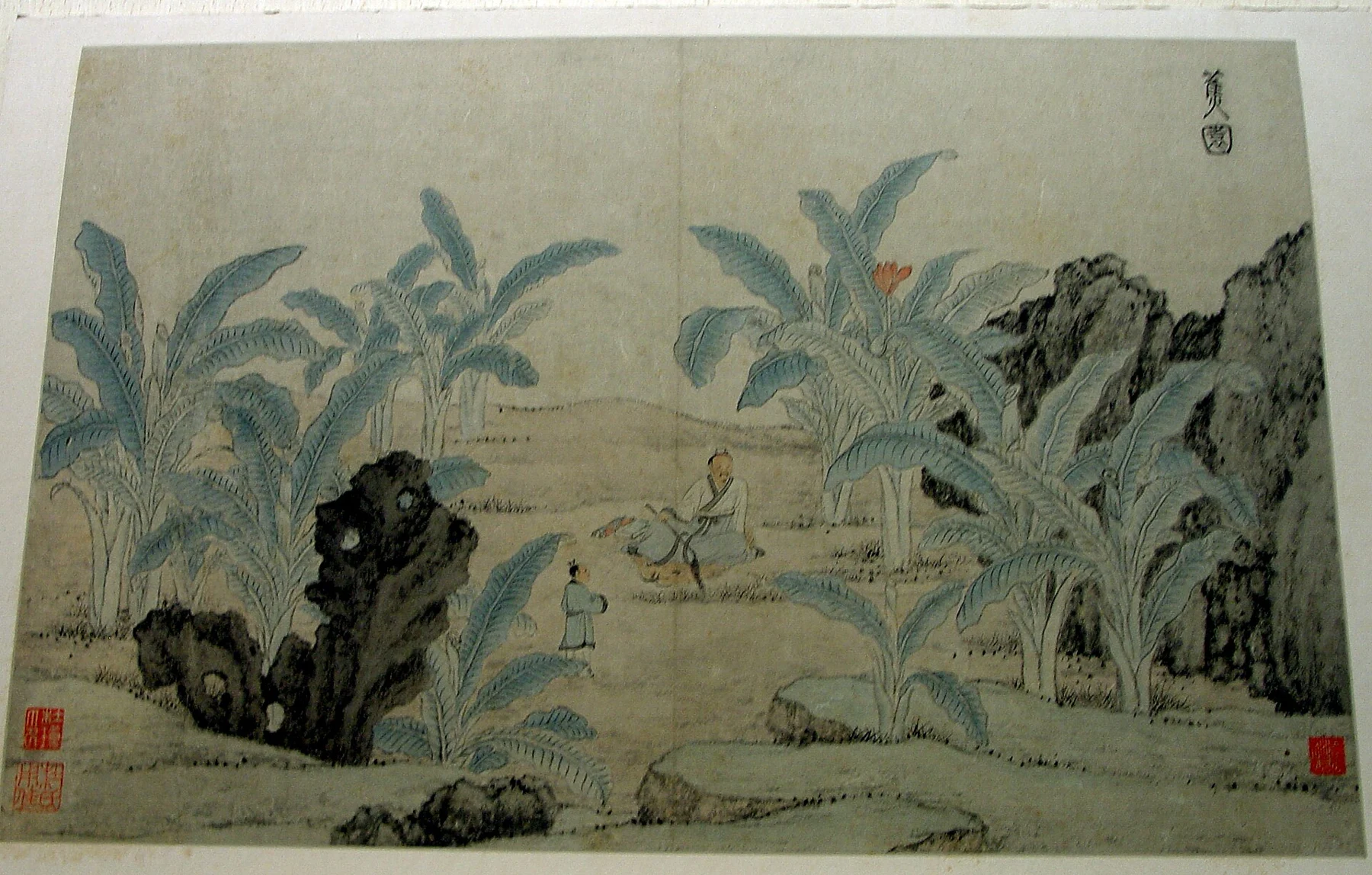 A small painted scene with trees, rocks and people in a lightly coloured landscape.