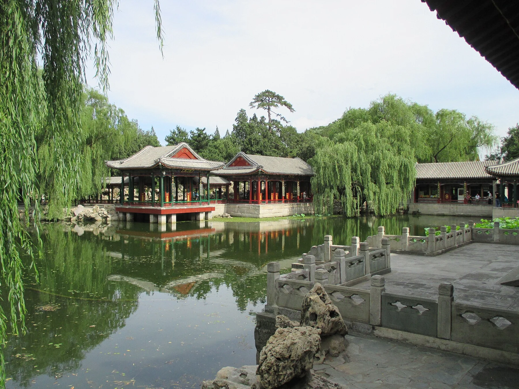 Pavilions and a covered walkway around the pond in the Garden of Harmonious Pleasures.